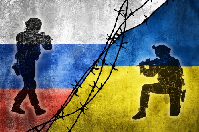 Grunge,Flags,Of,Russian,Federation,And,Ukraine,Divided,By,Barb