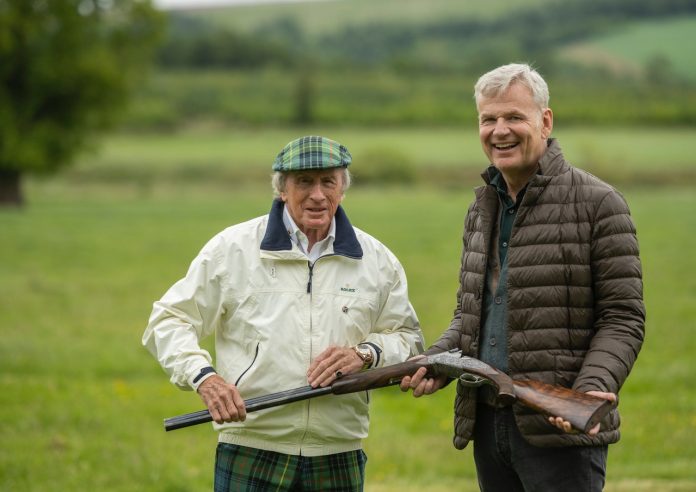 Jackie Stewart e Franco Gussalli Beretta con SL2 all'asta 1