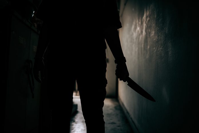 The,Shadow,Of,A,Female,Murderer,Stood,Terrifyingly,Holding,A