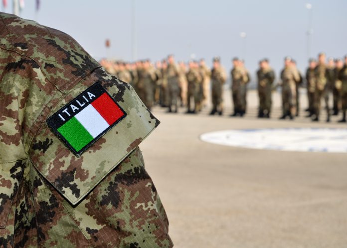 Close,Up,Of,An,Italian,Uniform,With,Digital,Camouflage,Pattern