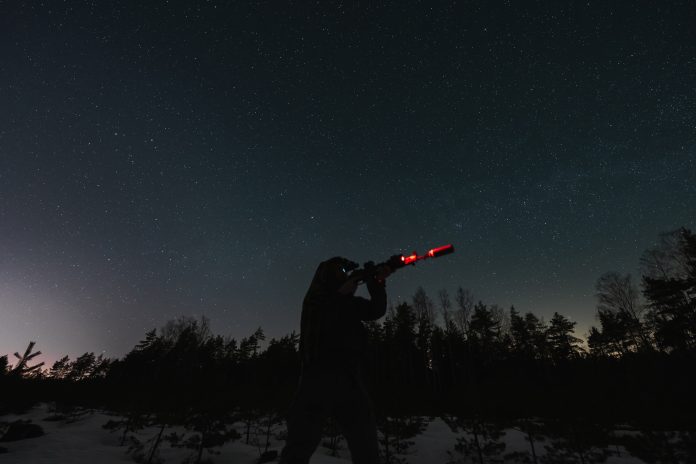 A,Soldier,With,A,Night,Vision,Monocular,And,A,Rifle