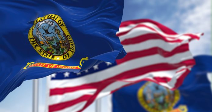The,Idaho,State,Flag,Waving,Along,With,The,National,Flag